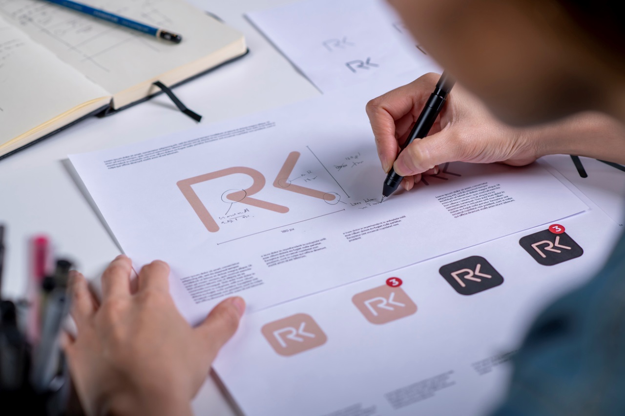 a person designing a logo